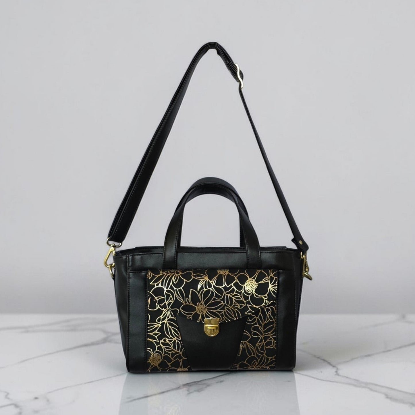 Structured Black Faux Leather Bag, Gold Floral Accent, Press Lock Hardware