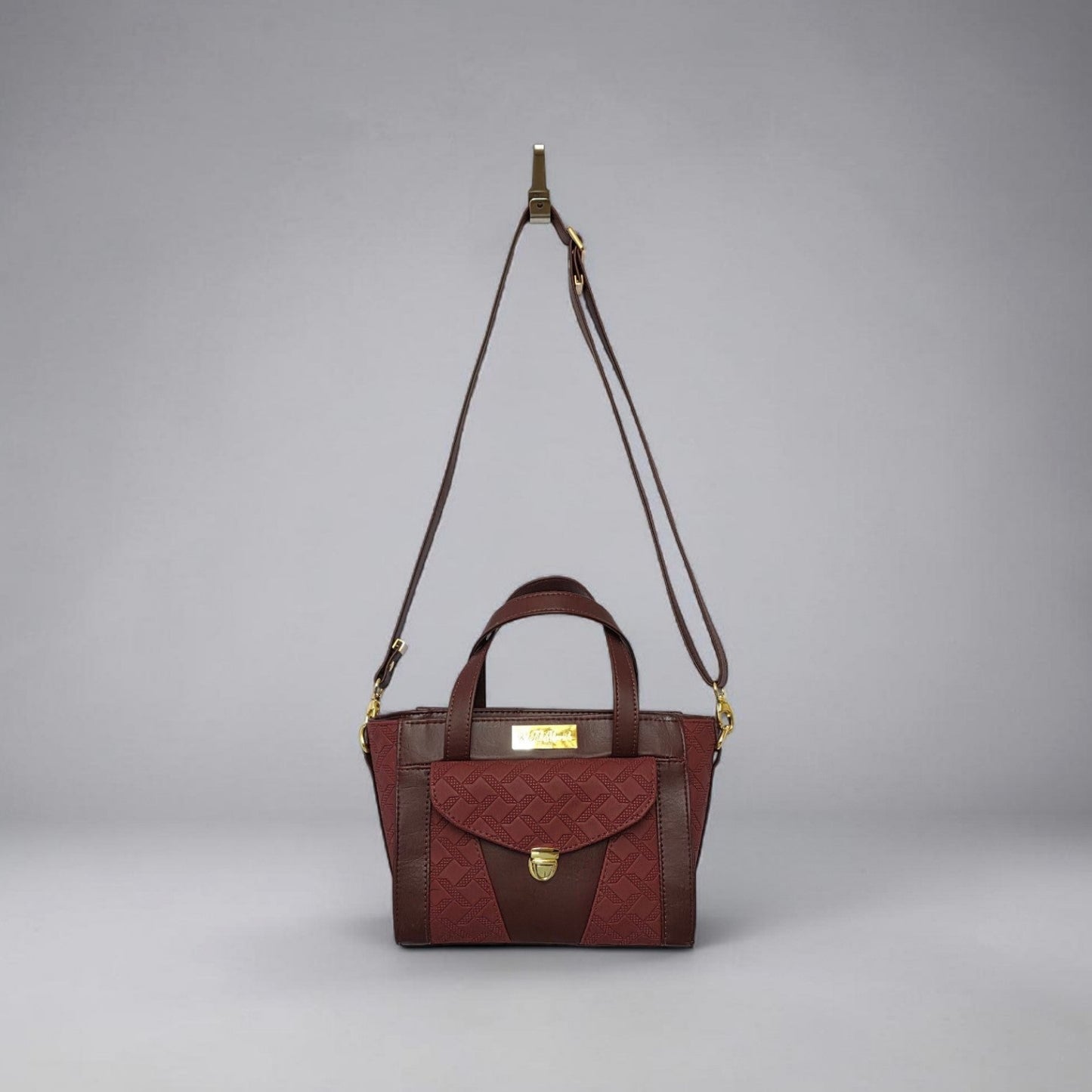 Burgundy quilted faux leather with gold hardware mini bag