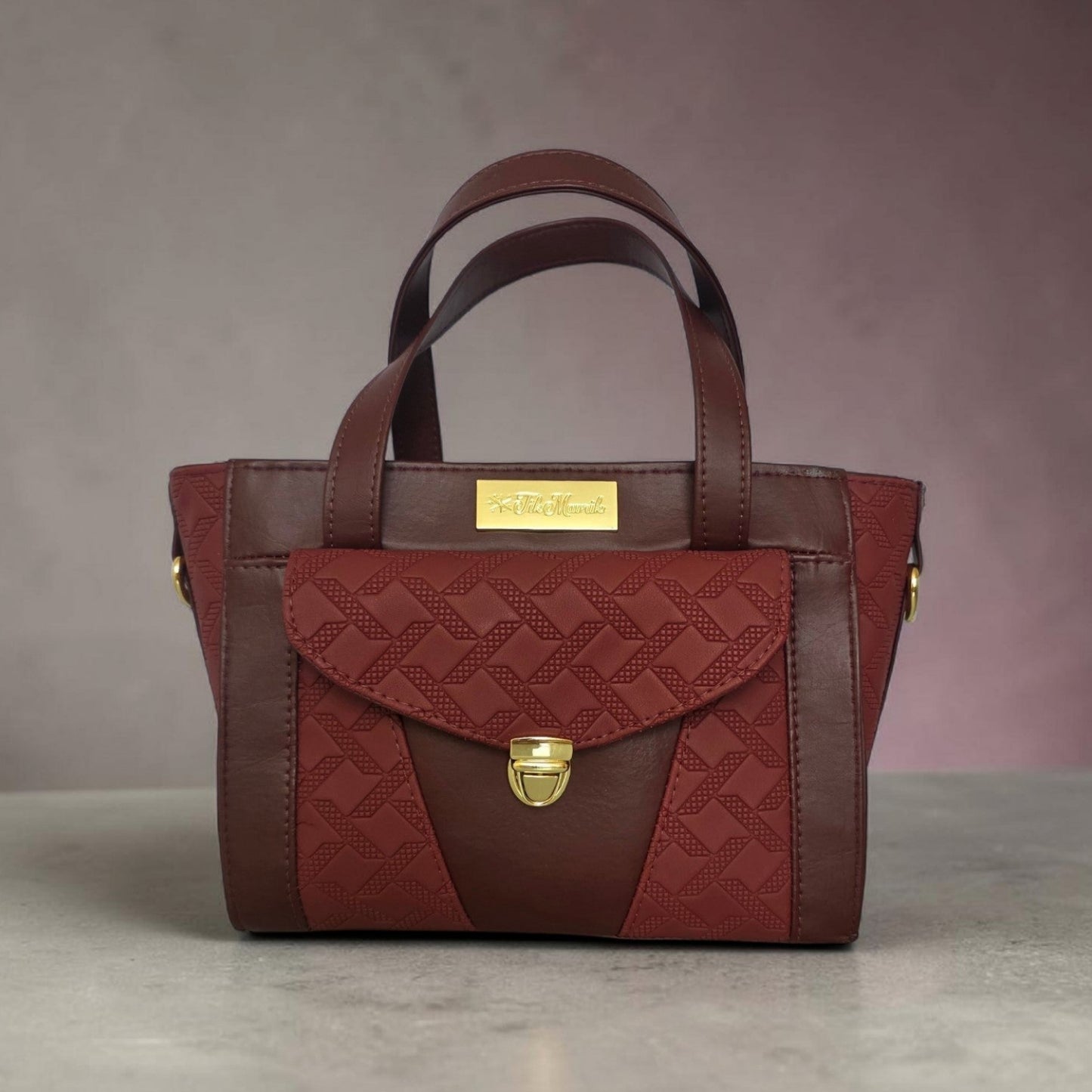 Burgundy quilted faux leather with gold hardware mini bag