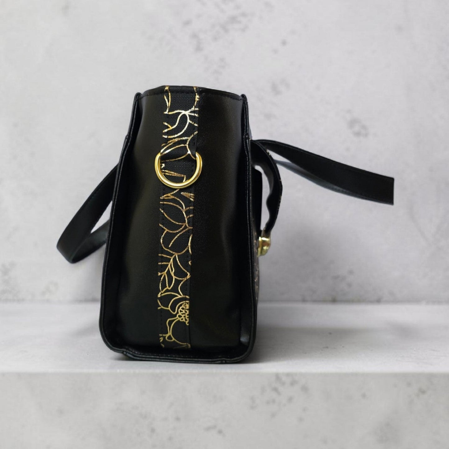 Structured Black Faux Leather Bag, Gold Floral Accent, Press Lock Hardware